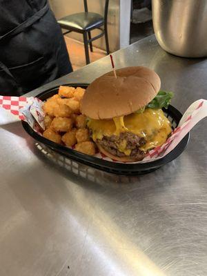 The Frankie's double meat burger with cheddar cheese and tots