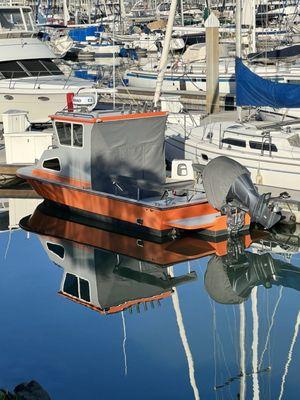 Everyone needs a little orange boat in the harbor