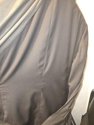 Pictures of jacket on hangar. Seams look terrible.