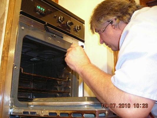 Checking to see what type of Oven repair needs to be done