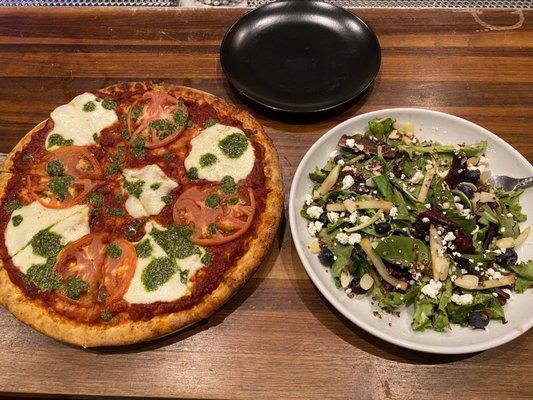 Maegherita pizza and "trendy" salad