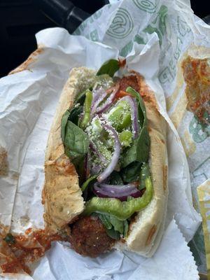 Meatball sub with veggies added