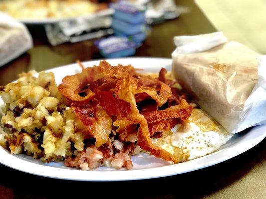 Corn beef hash breakfast with a side of bacon.  Too good.