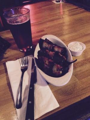 These stuffed pork jalapeños with bacon wrapped around are a must try! 〰