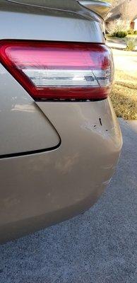 Bumper damage...hit while parked