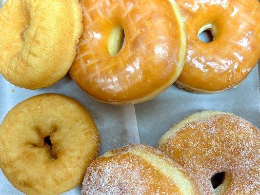 Various donuts (plain, glazed, sugar).