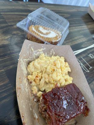 Partially eaten (sorry) Meatloaf with Mac and Cheese and pumpkin roll.