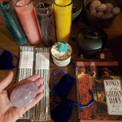 Incense, copal, candles, prosperity, cauldron, magic books.