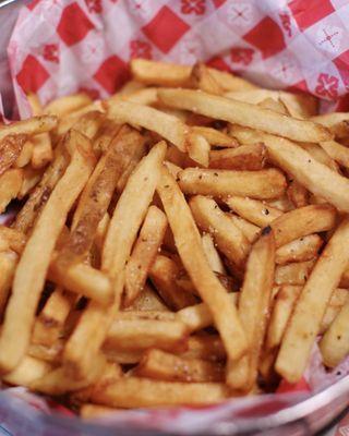 Golden fries, each piece boasting a crisp exterior and a fluffy, tender inside that promises pure potato perfection.