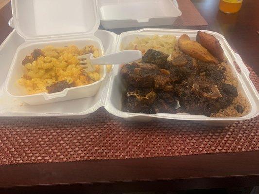 Mac n cheese, oxtails, cabbage and rice n peas mmmmmm good