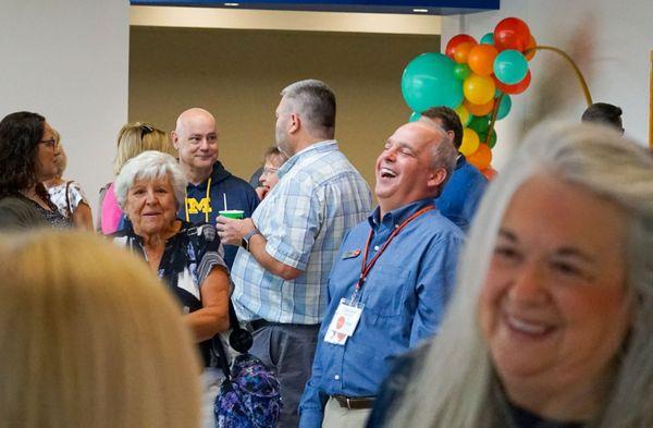 Linger in the lobby before or after service for connection, laughter, and simply sharing life together.