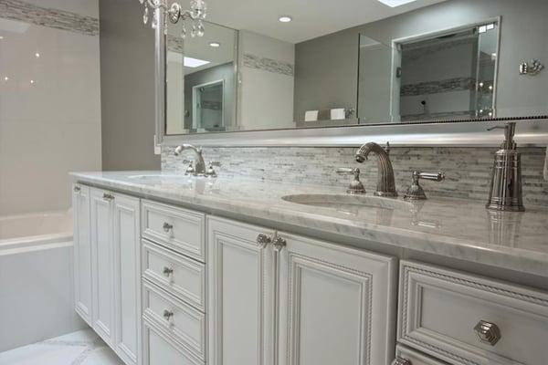 Ultra luxury bathroom remodel including shower steam unit, multiple body sprays, audio system, and jet tub with mood lighting