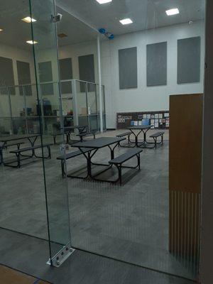 Racquetball room full of tables. Can't play Racquetball.