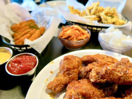 Soy garlic chicken, calamari sticks, & Parmesan Seasoned Fries