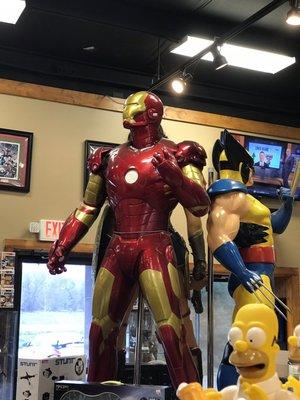 The huge Iron Man statue at the front of Jupiter Comics