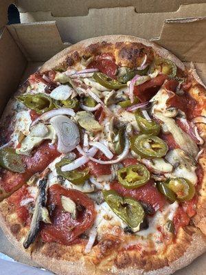 Personal Cheese Pizza with pepperoni, red onions, mushrooms and jalapeños