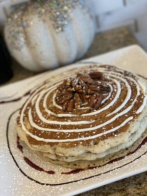 Cinnabomb Pancakes with pecans- cinnamon swirl, cream cheese glaze, and pecans