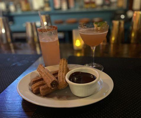 Yummy churros and chocolate sauce