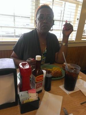 Mom enjoying her meal.