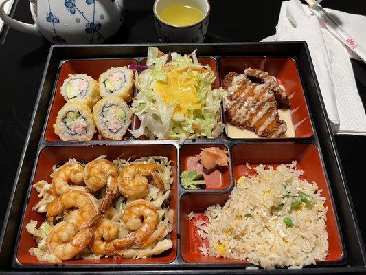 bento box with fried fish, fried rice, flash fried California rolls and teriyaki shrimp. It was a memorable meal!