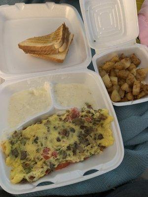 Farmers omelet with sides of grits/home fries/toast