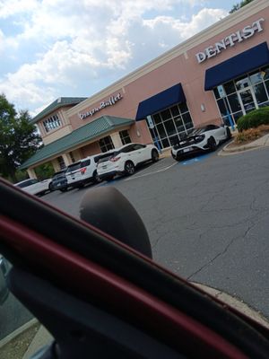 Nice "handicap" parking by what looks like one of their own dentists waltzing in. Totally a handicap-friendly car, eh?