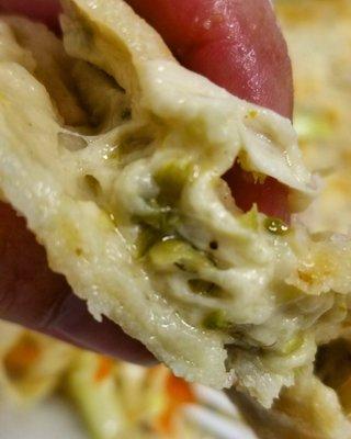 Pupusa interior. The best pupusa I have EVER had. Don't miss out!