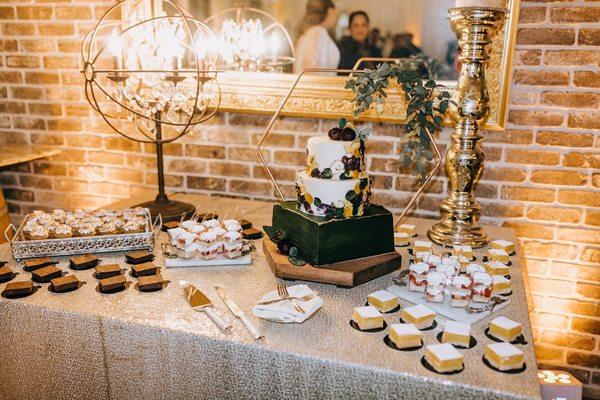 Dessert bar: brownies, s'more cupcakes, strawberry shortcake shooters, lemon bars and three tier wedding cake.