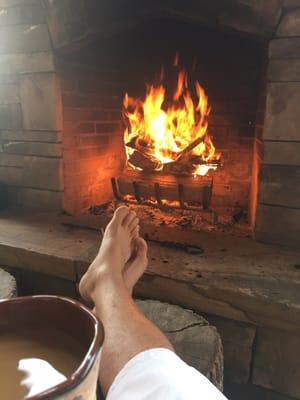 Morning coffee by the fire.