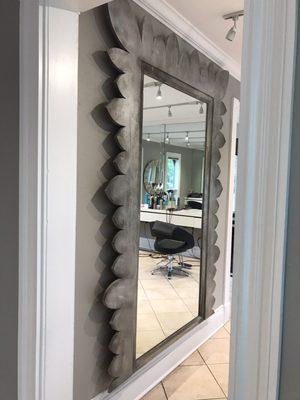 Glimpse of this AMAZING Mirror, that covers the entire wall, on the 1st floor of the Salon...