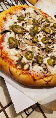 Jalapeño, mushroom, and chicken. Thick crust pizza.