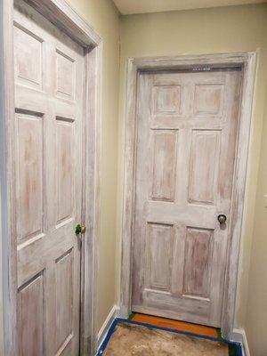 Plain wood doors going from wood to paint. We  must use bonding primer first before any paint can be added to wood.