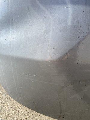 Right rear bumper paint damage