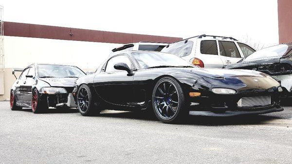 Shop cars.

1993 Mazda RX7 and 2006 Mitsubishi Evolution MR