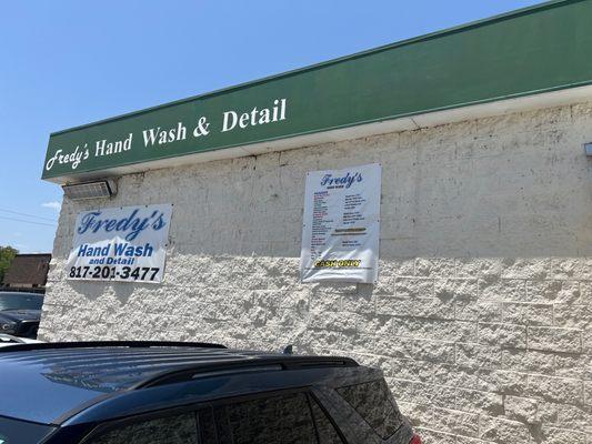 Fredy's hand wash & detail a little washing station behind a gas station.