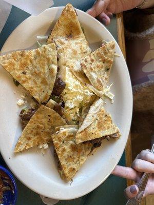 Steak triangular quesadilla