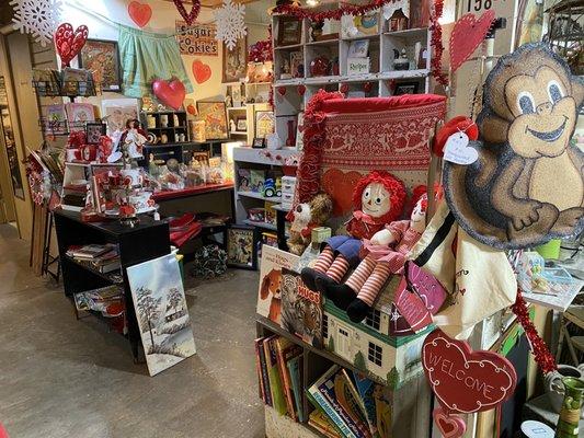 Sugar Cookie's booth offers seasonal and holiday treasures along with vintage books, toys, figurines, framed pictures, and other decor.