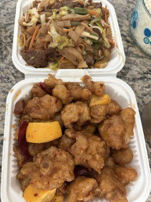 Spicy beef chow fun and orange chicken