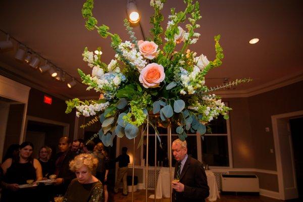 These tall arrangements got so many compliments, and they stayed lovely for a long time after the wedding.