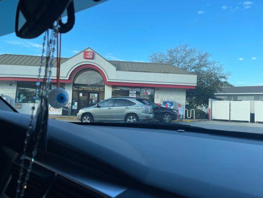 Filling up Ernie's car.