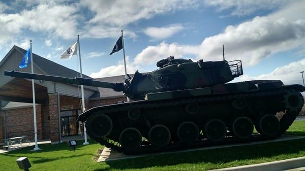 Tank in front of building