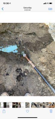 Building 1 1/2" main water service line repair under street.