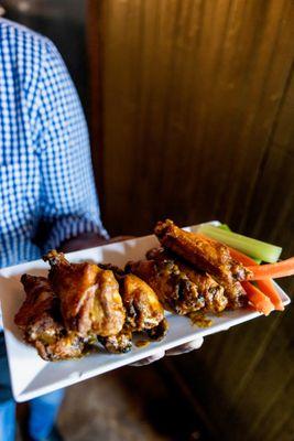 Wings cooked duck confit with your choice of The Tavern special sauce blends.