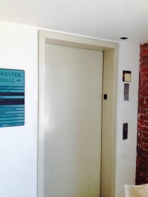 Before picture of elevator door on commercial painting job.