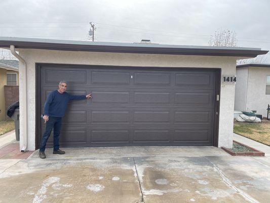 Supplied and installed a new garage door with an emergency release lock.