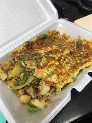 Spanish omelette and home fries.