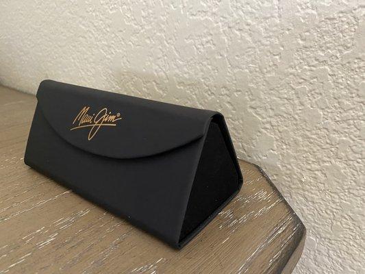 Maui Jim sunglasses and collapsible case.