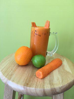 Orange boost fresh vegetable juice