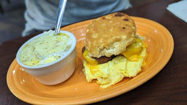 Sausage egg and cheese biscuit. Huge!   Side of grits