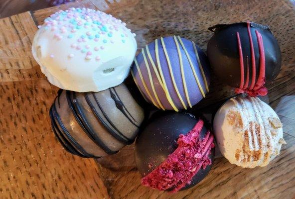 Cake Balls including Vanilla, Salted Caramel, Lemon Blueberry, Chocolate Raspberry and Cinnamon Toast Crunch from Downtown Dempsey's